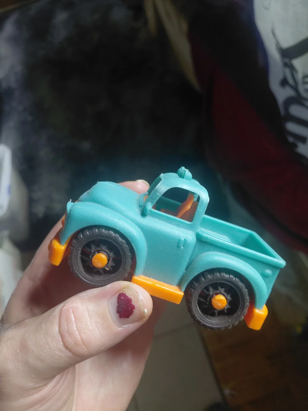 toy is a pickup truck from the B. toys Happy Cruisers collection